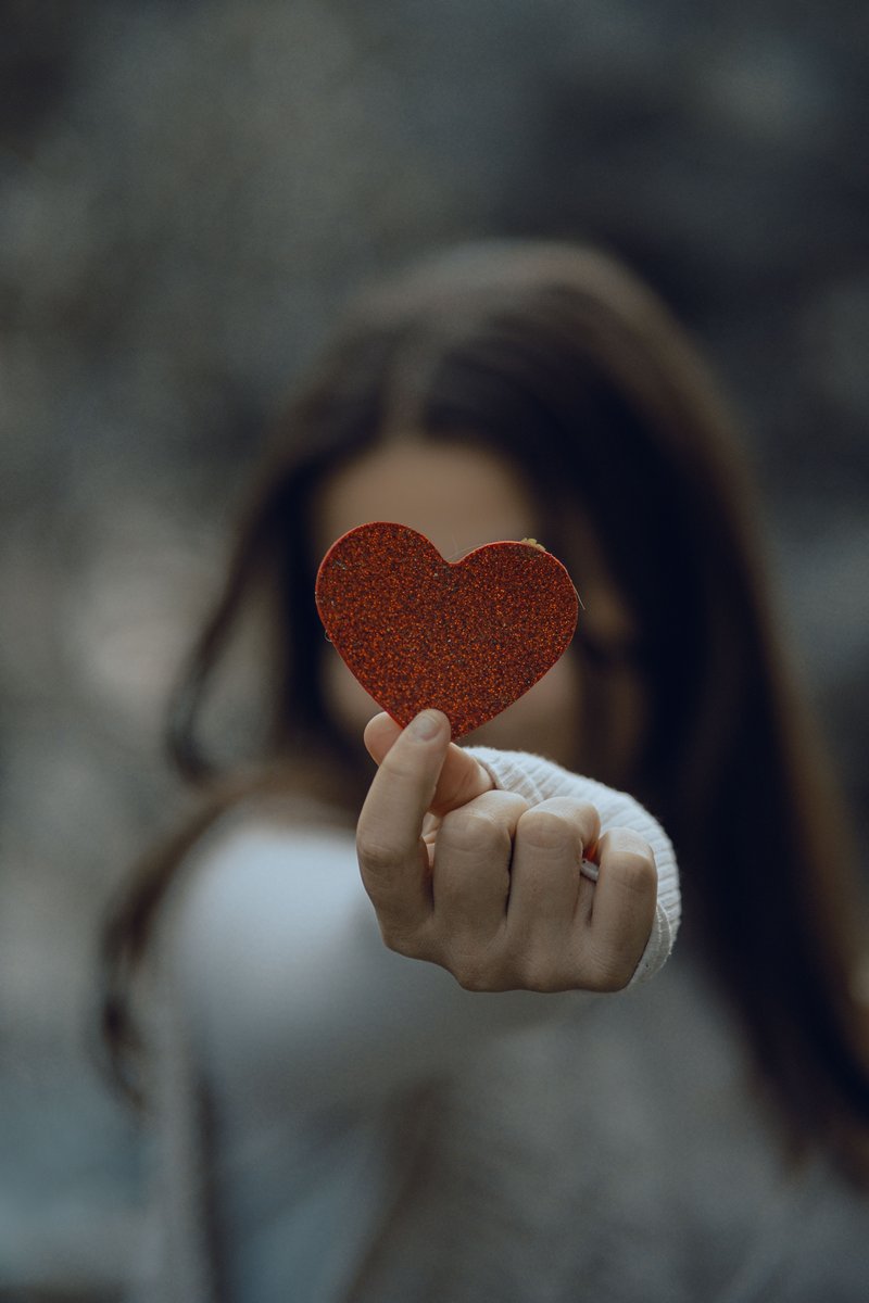 Portrait of Woman Holding a Heart · Free Stock Photo