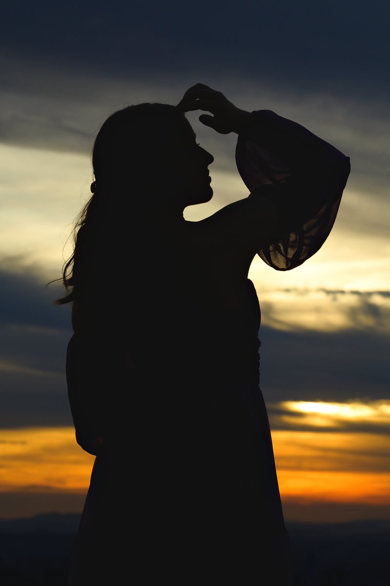Woman Silhouette at Sunset · Free Stock Photo
