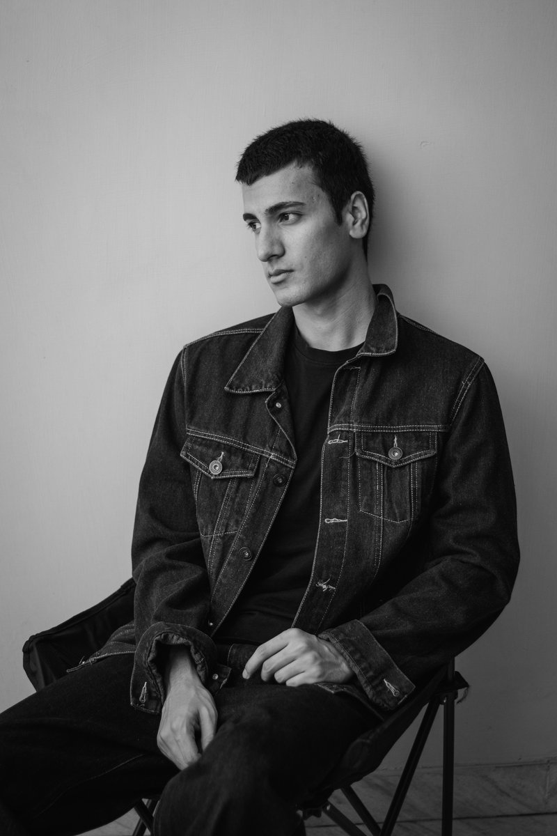 Black and White Portrait of Young Man in Denim · Free Stock Photo