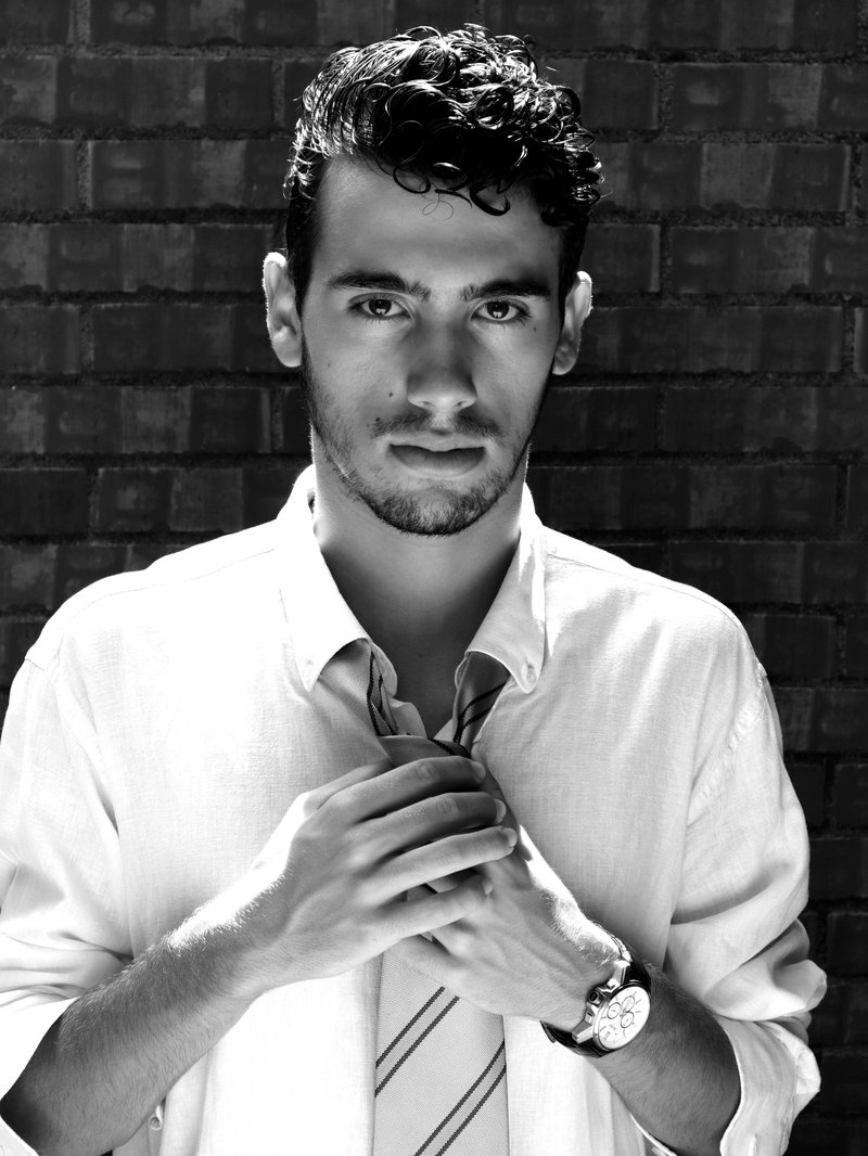 Grayscale Photo of a Man in White Long Sleeves · Free Stock Photo