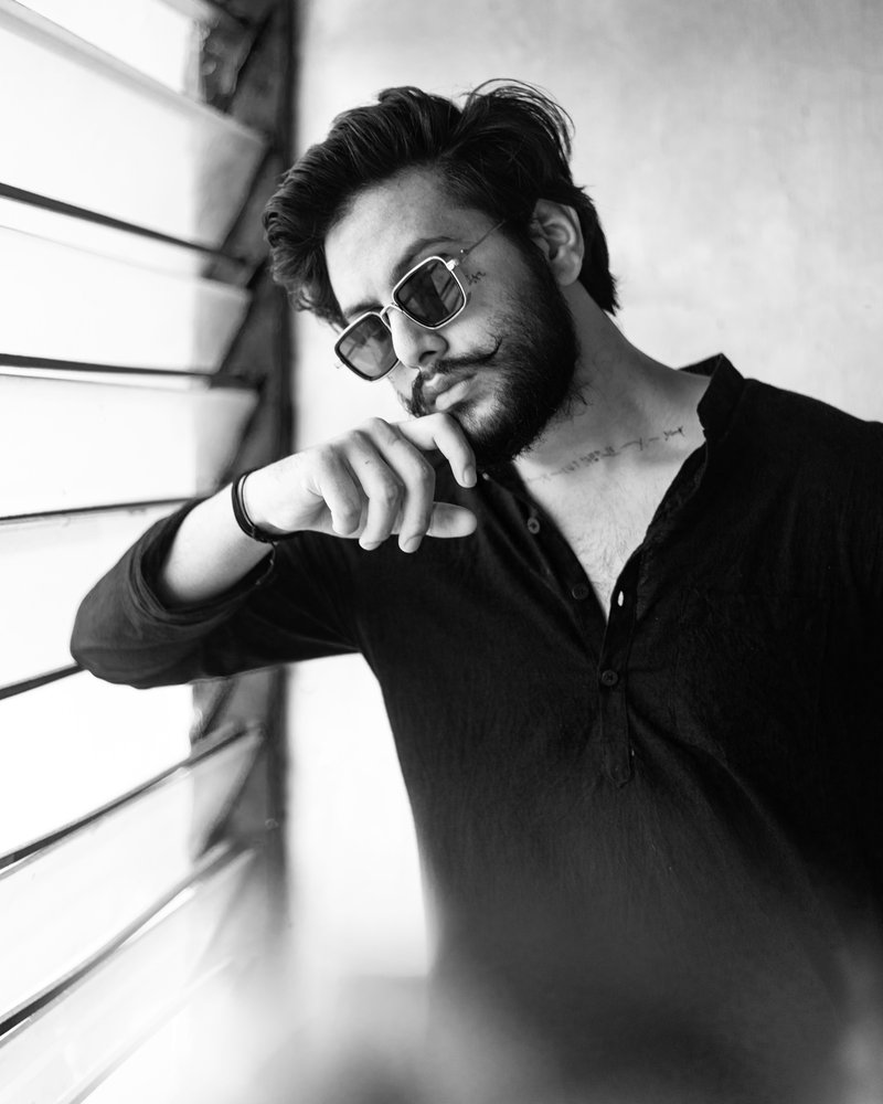 Monochrome Photography of Man Wearing Sunglasses · Free Stock Photo