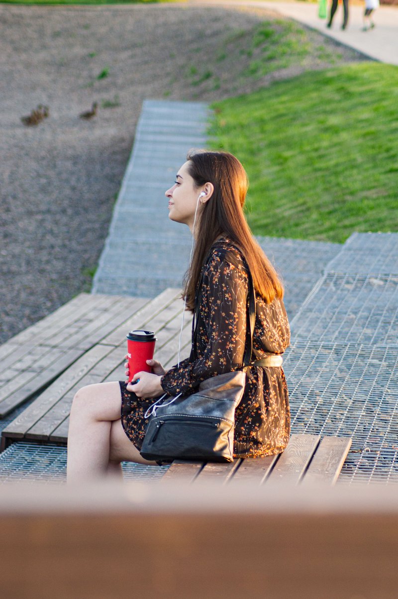 Woman Sitting Alone in a Park · Free Stock Photo
