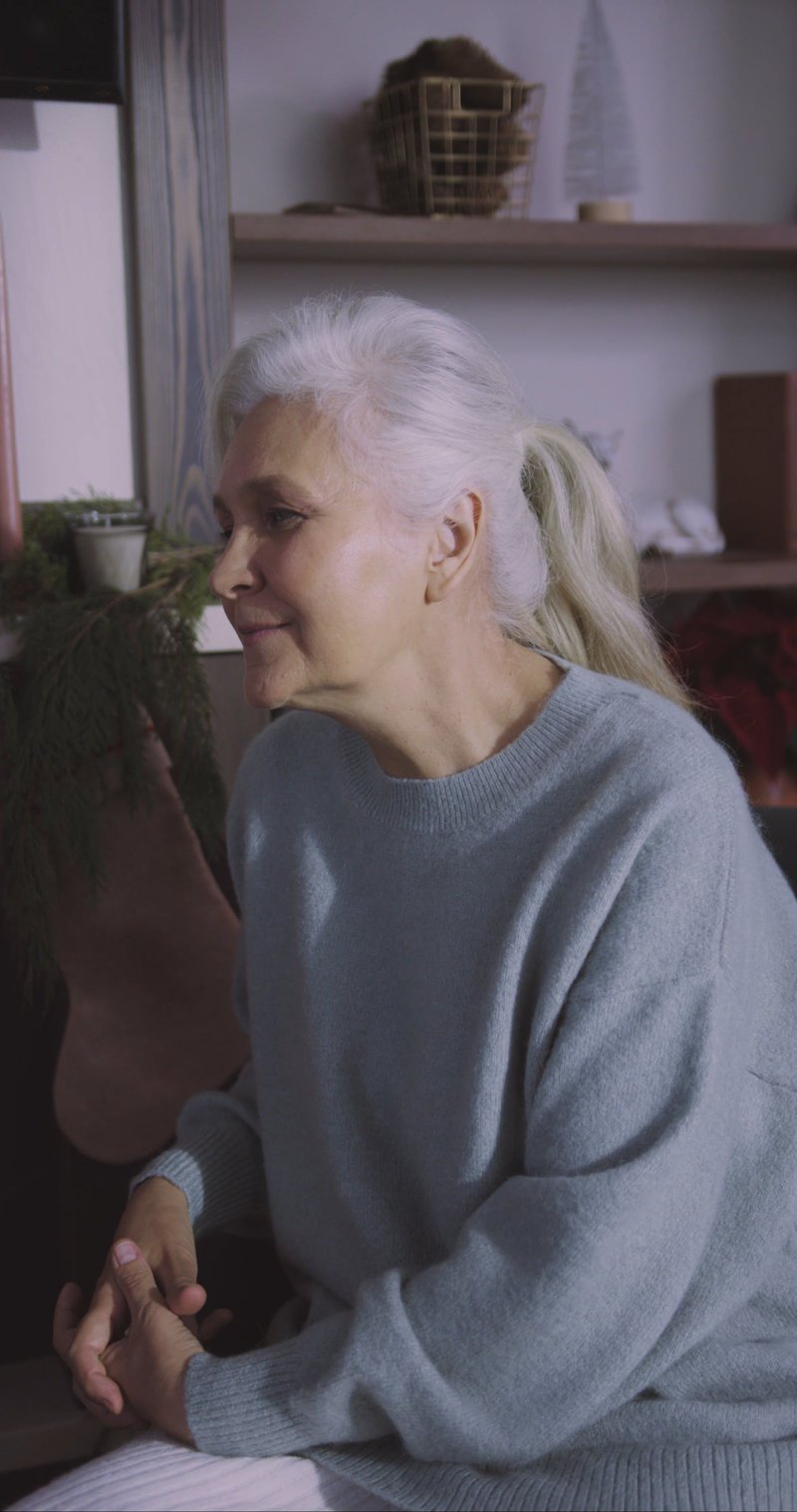 Grandma Sitting In The Living Room