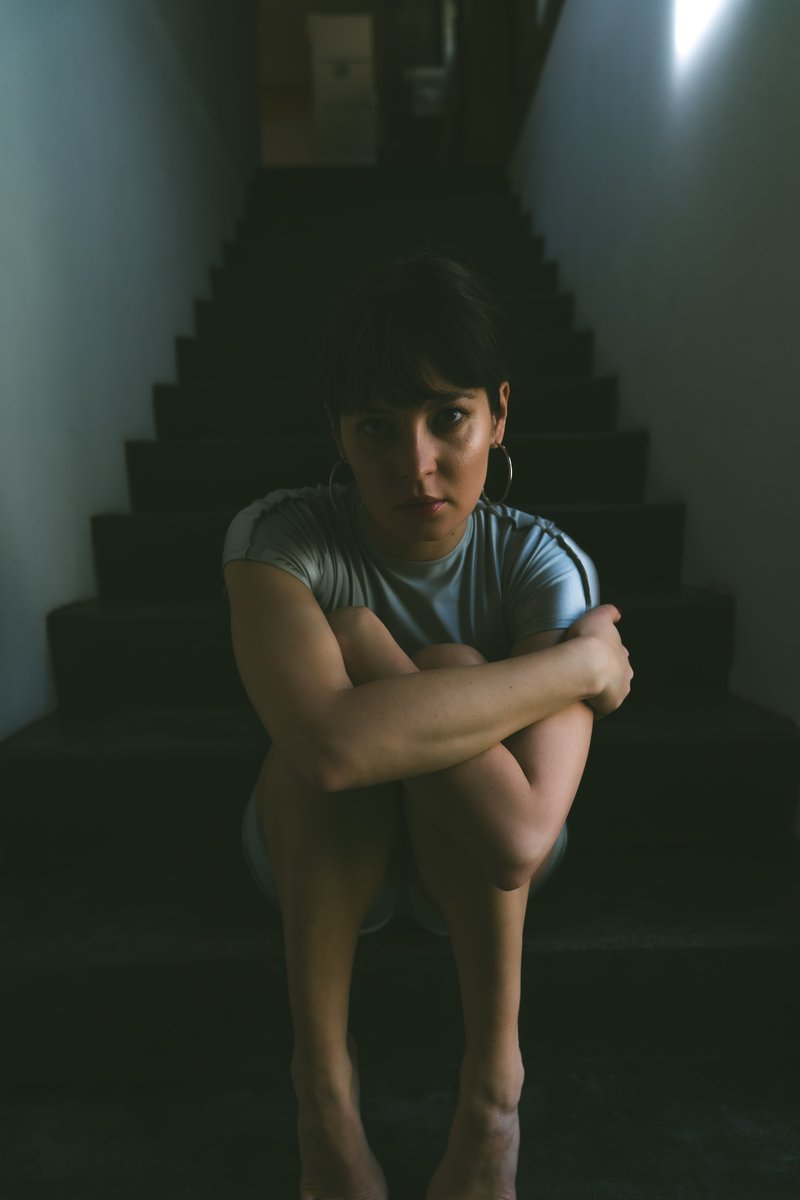 Woman Sitting on the Steps · Free Stock Photo