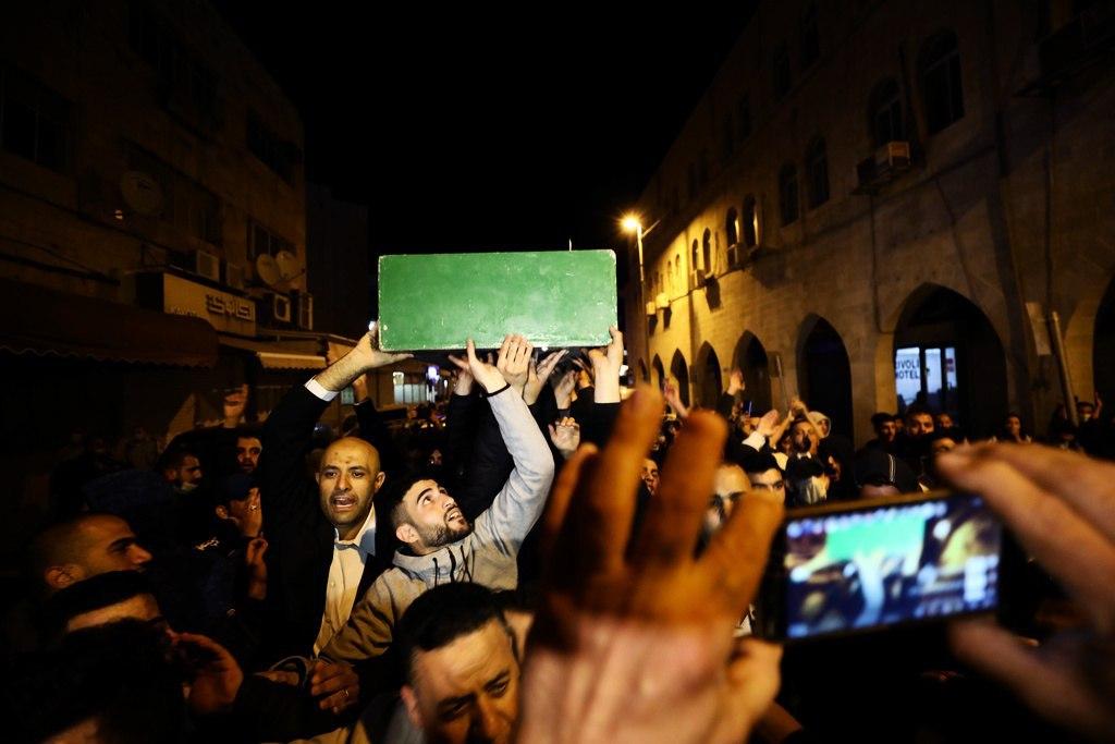 صور حصرية من جنازة الشهيد إياد الحلاق