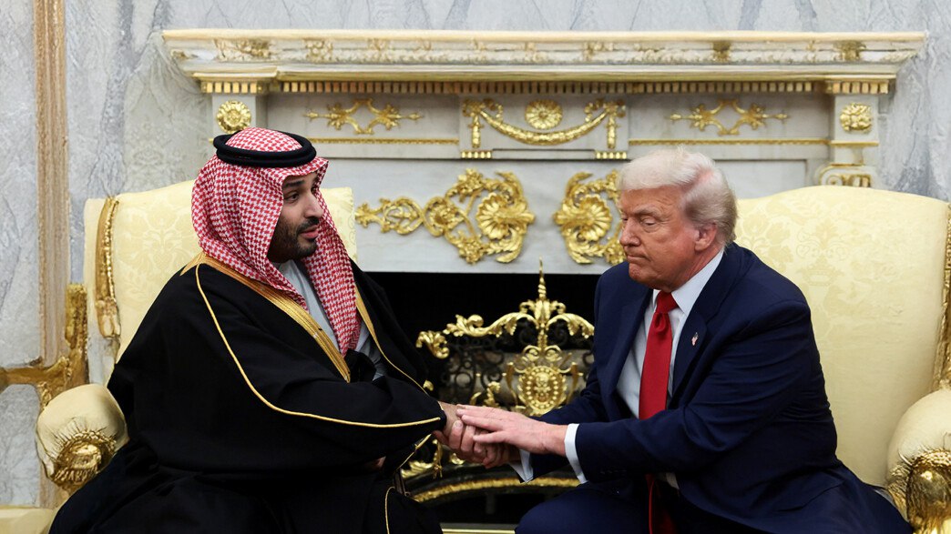 Protesters holding signs