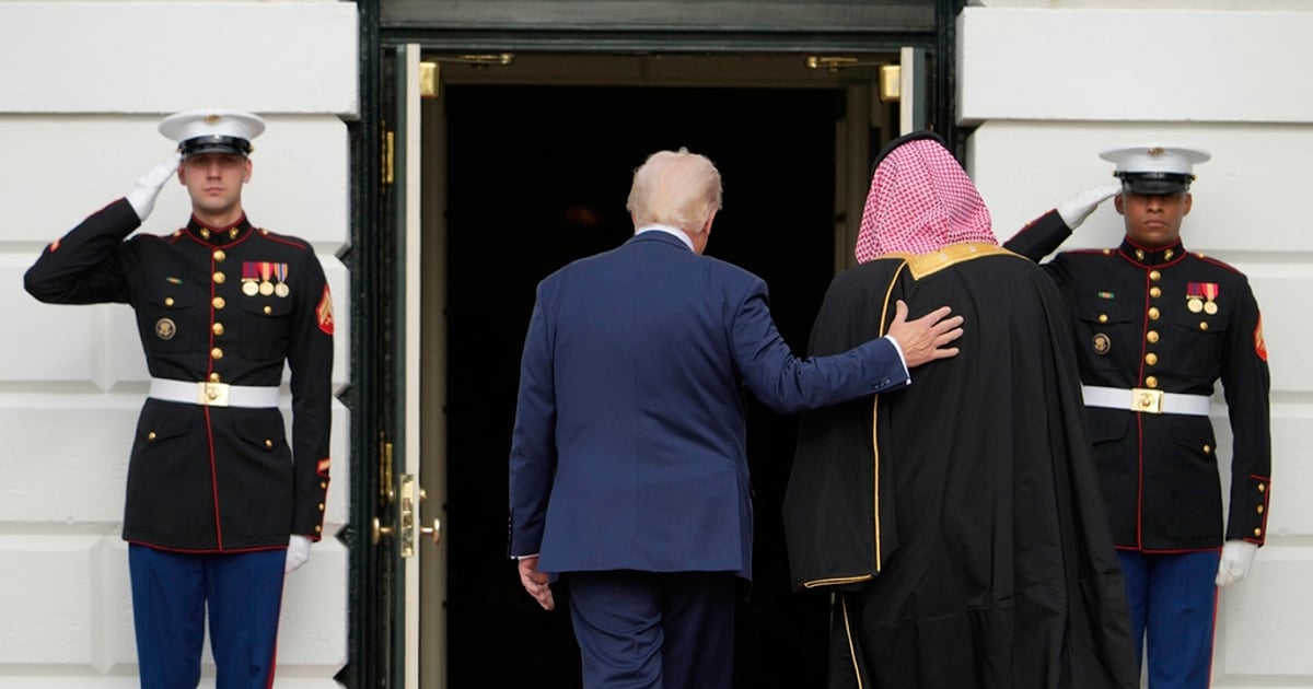 Protesters holding signs