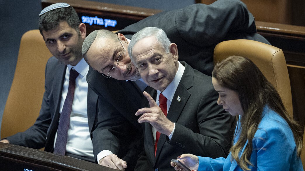 Protesters holding signs