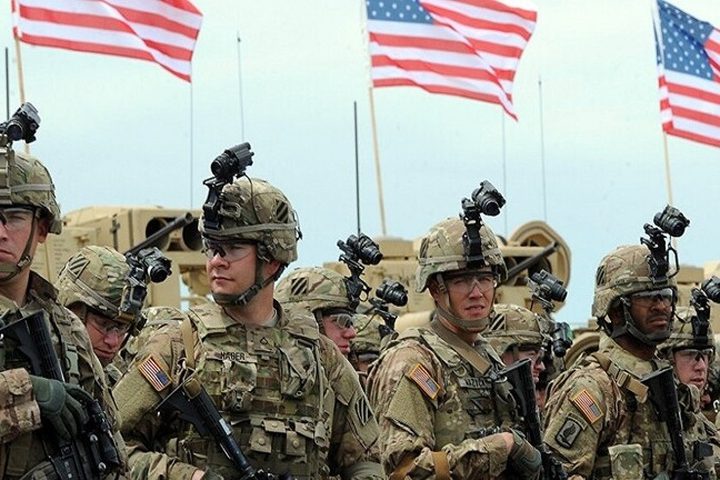 Protesters holding signs