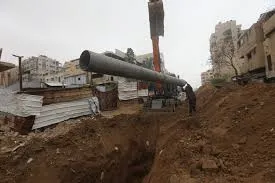 فريق عمل لنزع السلاح وآخر لإعادة تأهيل الصرف الصحي بغزة