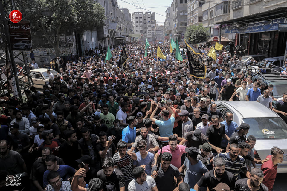 Huge crowds in Gaza join funeral of three Palestinians killed by IOF