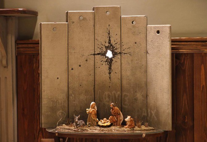 'Scar of Bethlehem'.. Banksy unveils dark nativity in Bethlehem