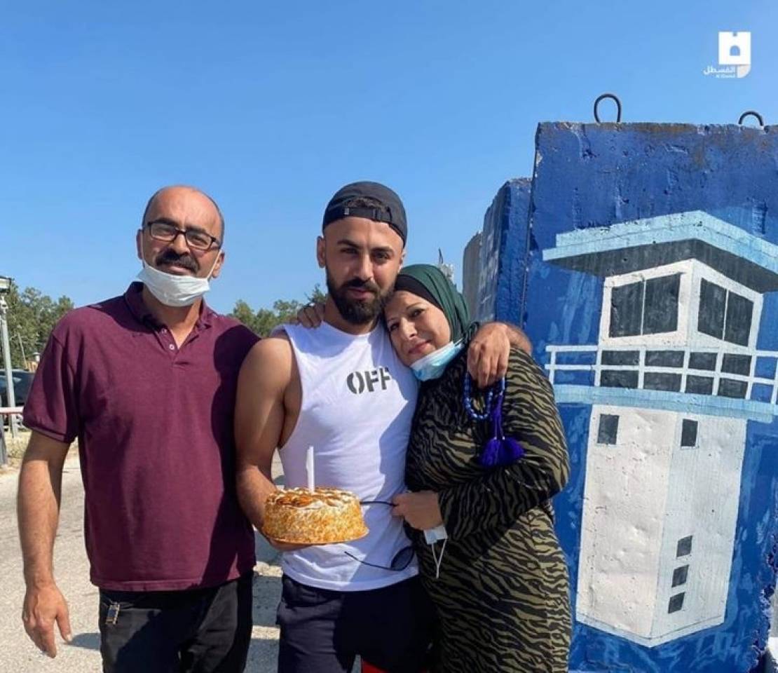 Video| Palestinian mother celebrates her son's birthday in front of Israeli  jail right before he starts jail time
