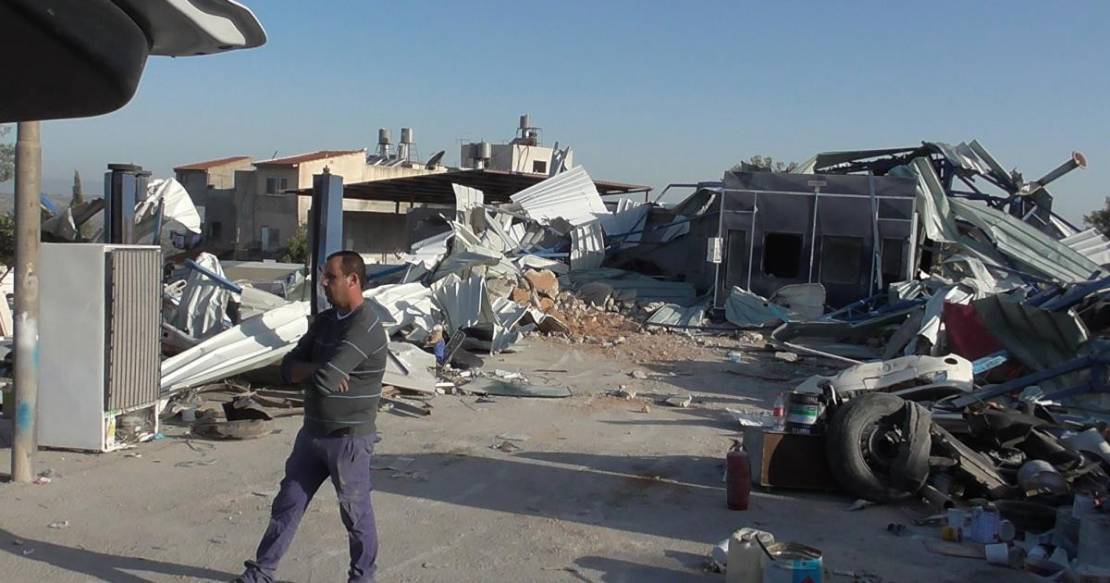 'Israel' demolishes two repair shops, notifies two rooms of demolition