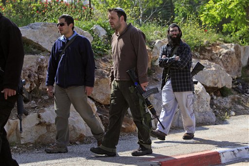 Settlers set up mobile house, plant trees in Palestinian land to confiscate it