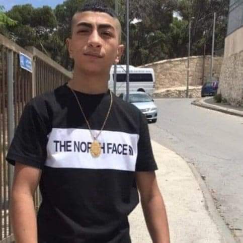 Israeli forces arrest Palestinian youth after brutally beat him