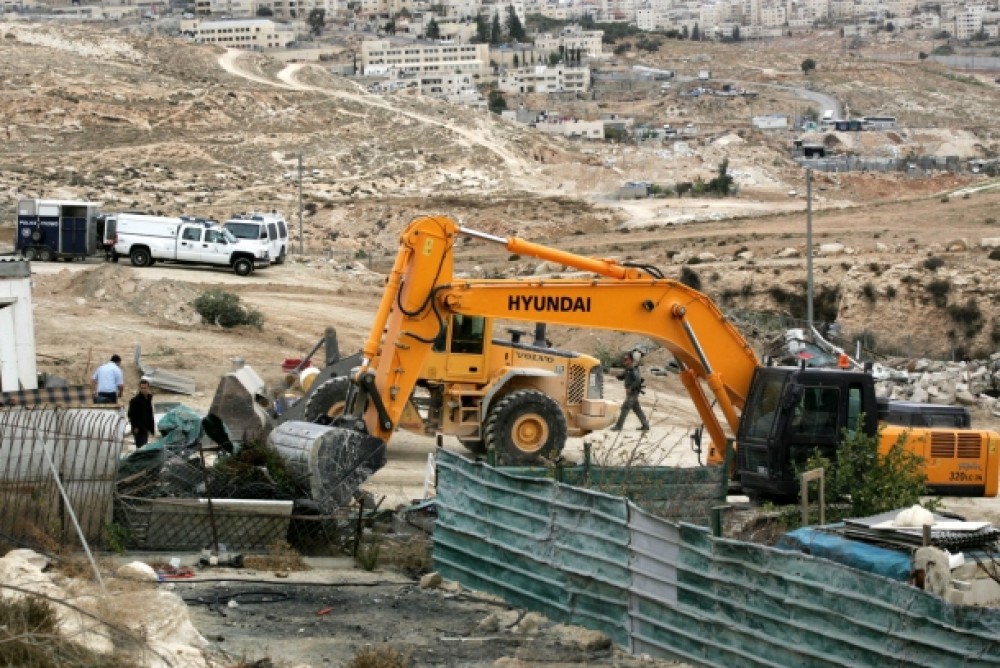 Israeli forces demolish 30 Palestinian-owned structures north of occupied Jerusalem