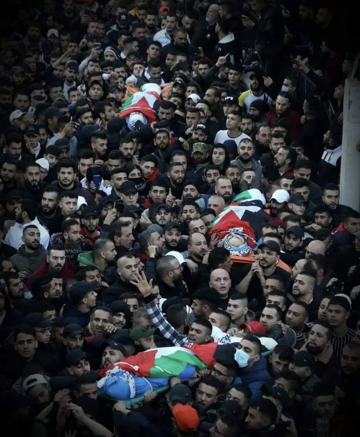 Angry crowd participates in funeral of 3 Palestinians assassinated by Israeli soldiers