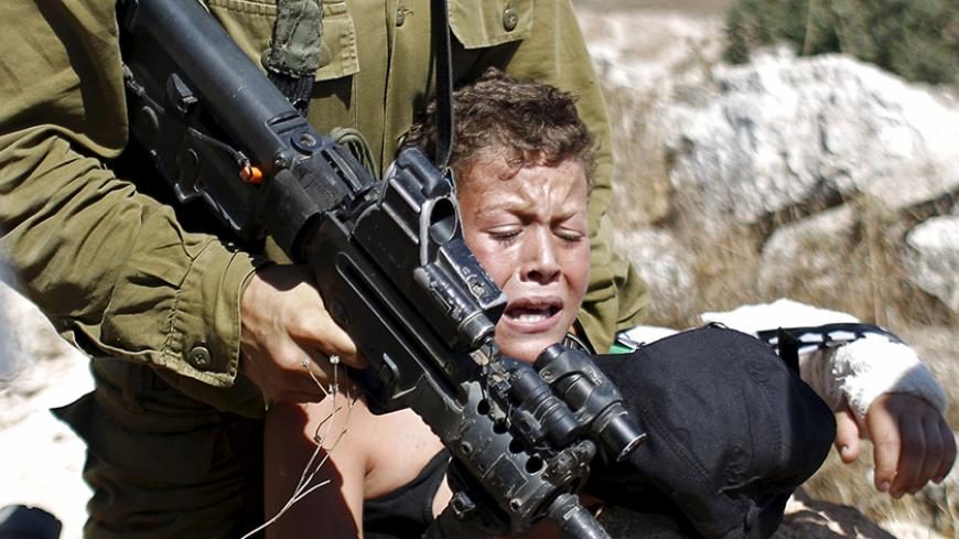 Israeli legal center calls to stop traumatic practice of night arrests of Palestinian minors