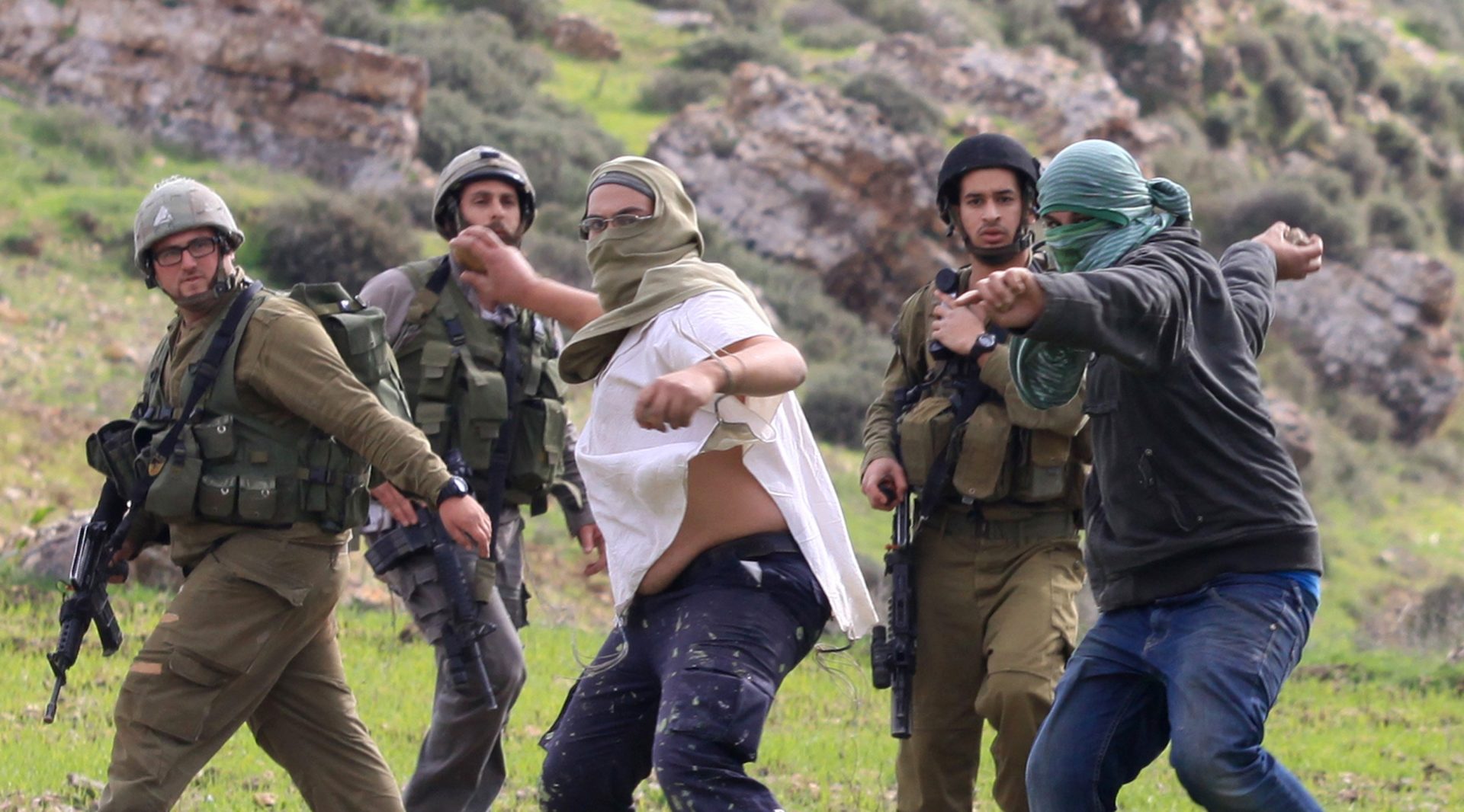 Israeli settlers assault Palestinians in Nablus, bulldoze land in Northern Jordan Valley