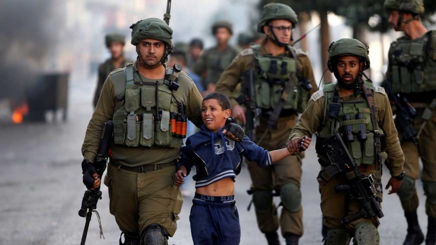 ‘Israel’ arrested 539 Palestinians last month, including 62 minors