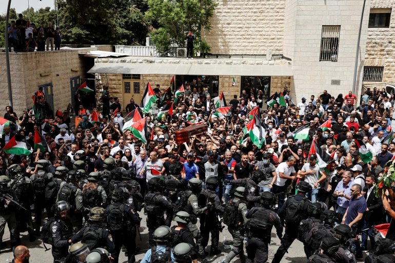 Israeli forces assault mourners carrying Al Jazeera’s Abu Aqleh’s body