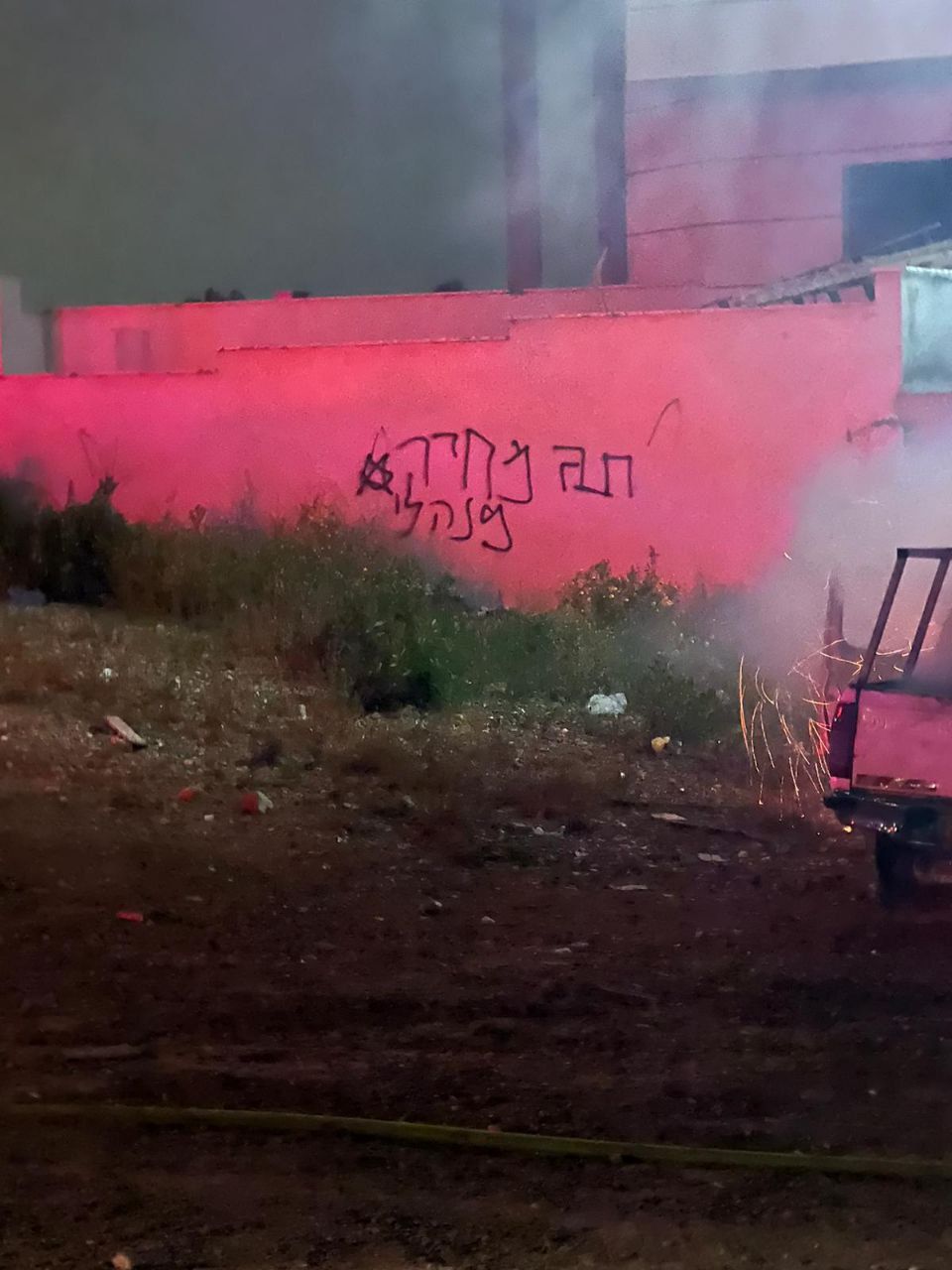 Extremist Israeli settlers set Palestinian vehicles on fire, spray hate graffiti in Kafr Qasim