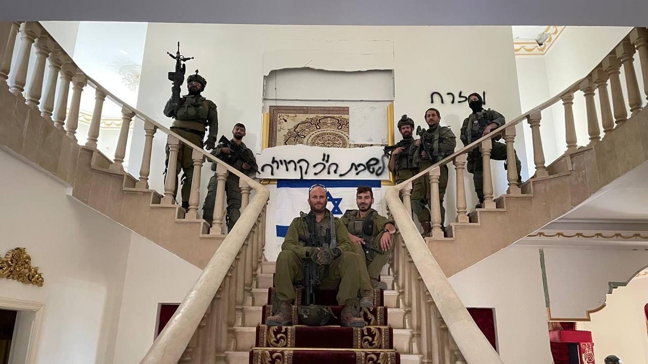 Israeli MK takes photo with soldiers in mock “office” in Lebanon home