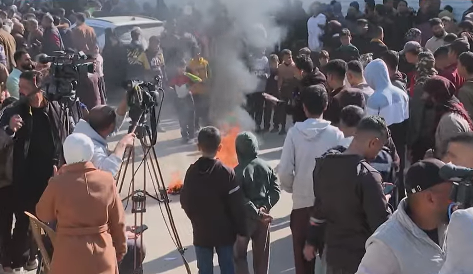 Freed Palestinian Detainees Burn Forced Israeli-Issued Uniforms with Star of David and Racist Slogans