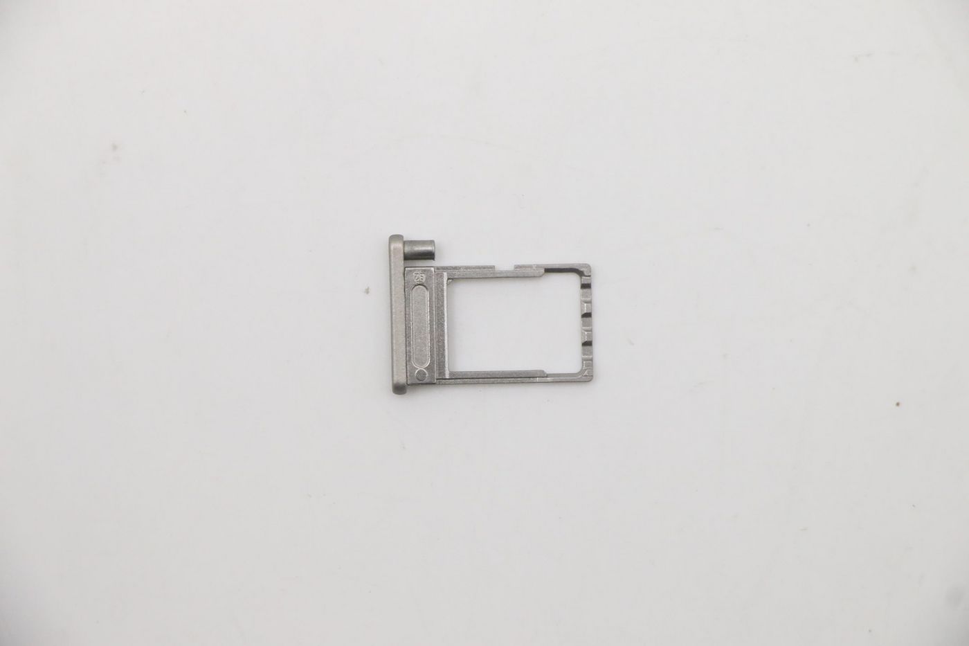 Titanium mechanical SIM tray 