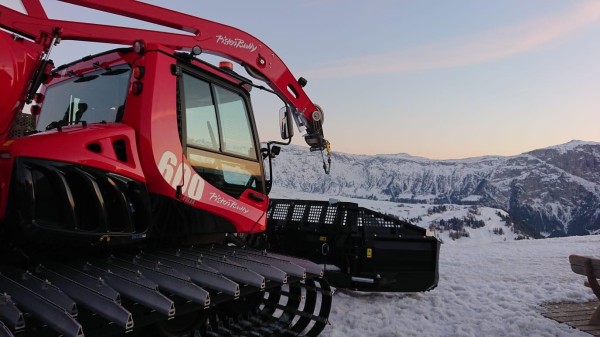 Riding a Snow Groomer
