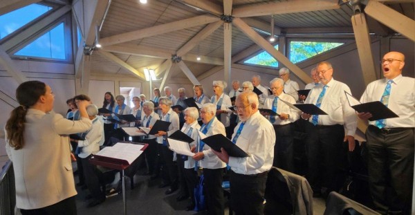 Performance of Chorus Crescendo with Supporting Band at the Harvest Festival Service