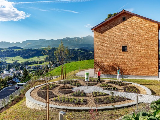 Public guided tour in the medicinal plant show garden of A. Vogel