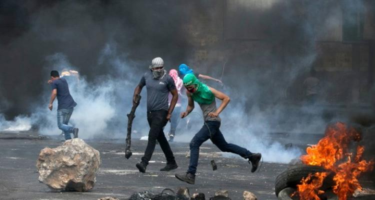 إضراب شامل يعم مدن الضفة المحتلة تنديدا بمجزرة المعمداني