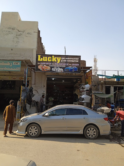 Lucky Car Modification , EFI ELECTRICIAN, MECENICAL, FIBER BODY KIT AND FACE in Faisalabad, Faisalabad