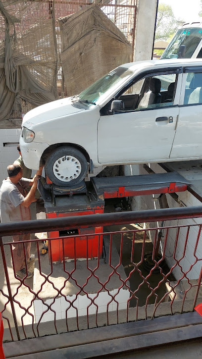 Ali Alighnment & wheel balancing club in Model Town, Gujranwala