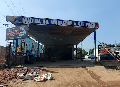 Madina Oil Workshop & Car wash in Gt Road, Gujranwala