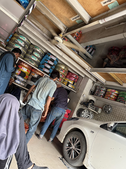 Naizi Wheel Alignment and Balancing Tyre Shop in Federal B Area, Karachi