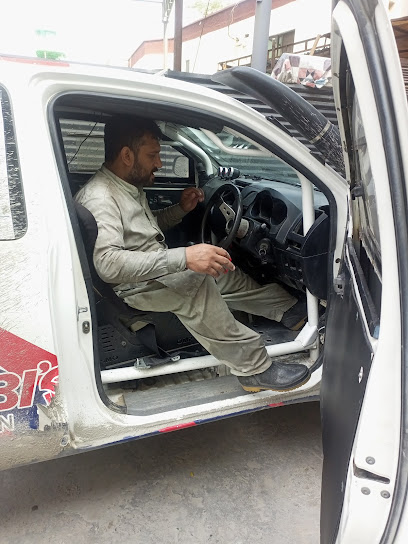 Universal service station and auto repair workshop in Gulberg, Lahore