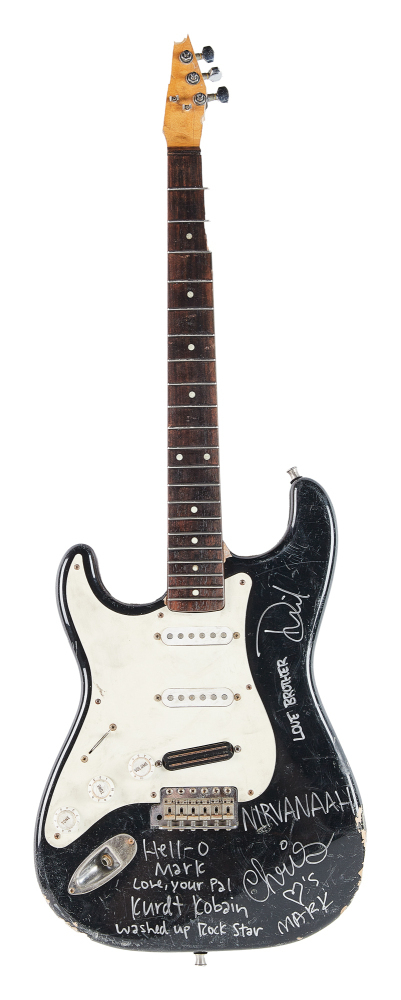 NIRVANA: KURT COBAIN SMASHED AND BAND-SIGNED 