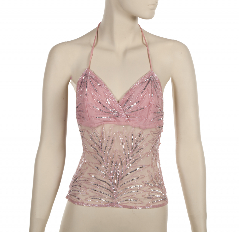 A pair of embellished tops from the wardrobe of Miley Cyrus. A