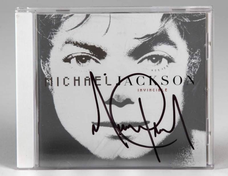 MICHAEL JACKSON SIGNED INVINCIBLE COMPACT DISC