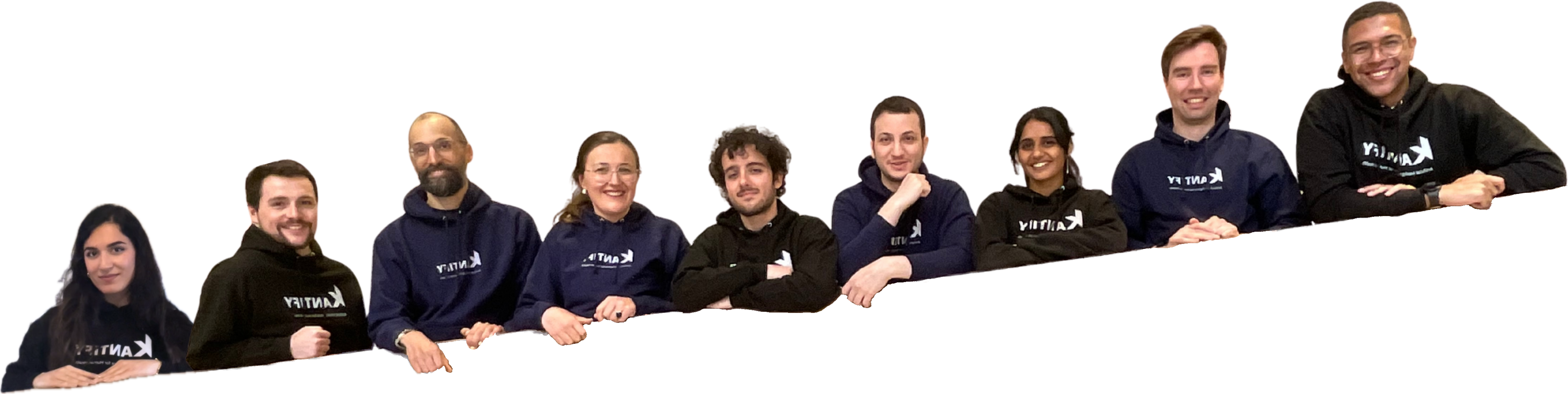 Kantify team standing on a stair handrail