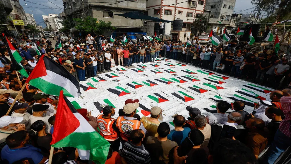 Thousands mourn 51 Palestinians recovered from Nuseirat camp rubble
