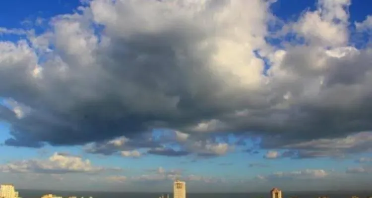 Noticeable temperature drop with a chance of scattered rain