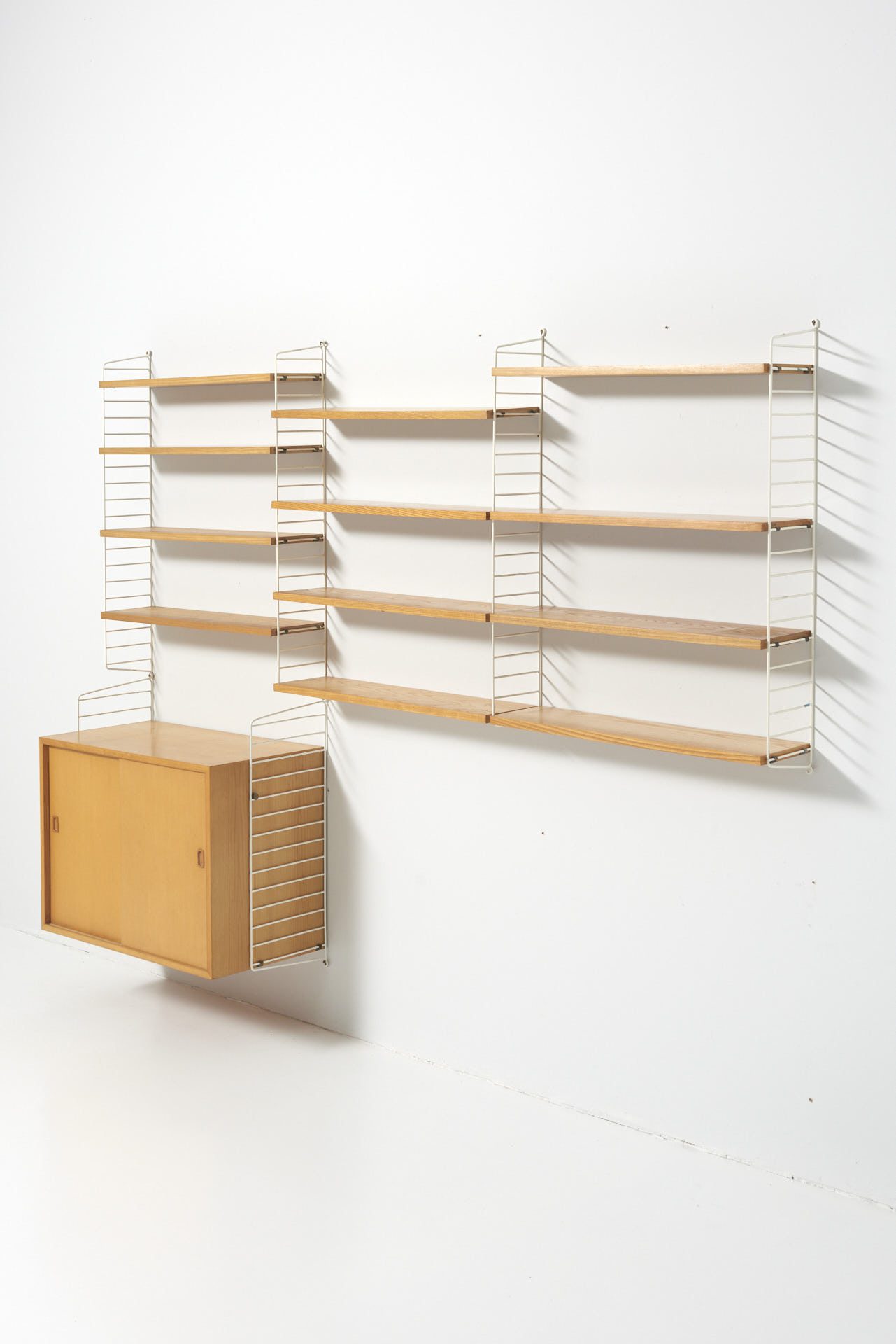 String Wall System in Ash by Nils Strinning