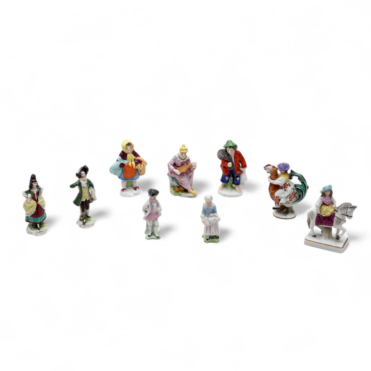 Nine Miniature Porcelain Figures