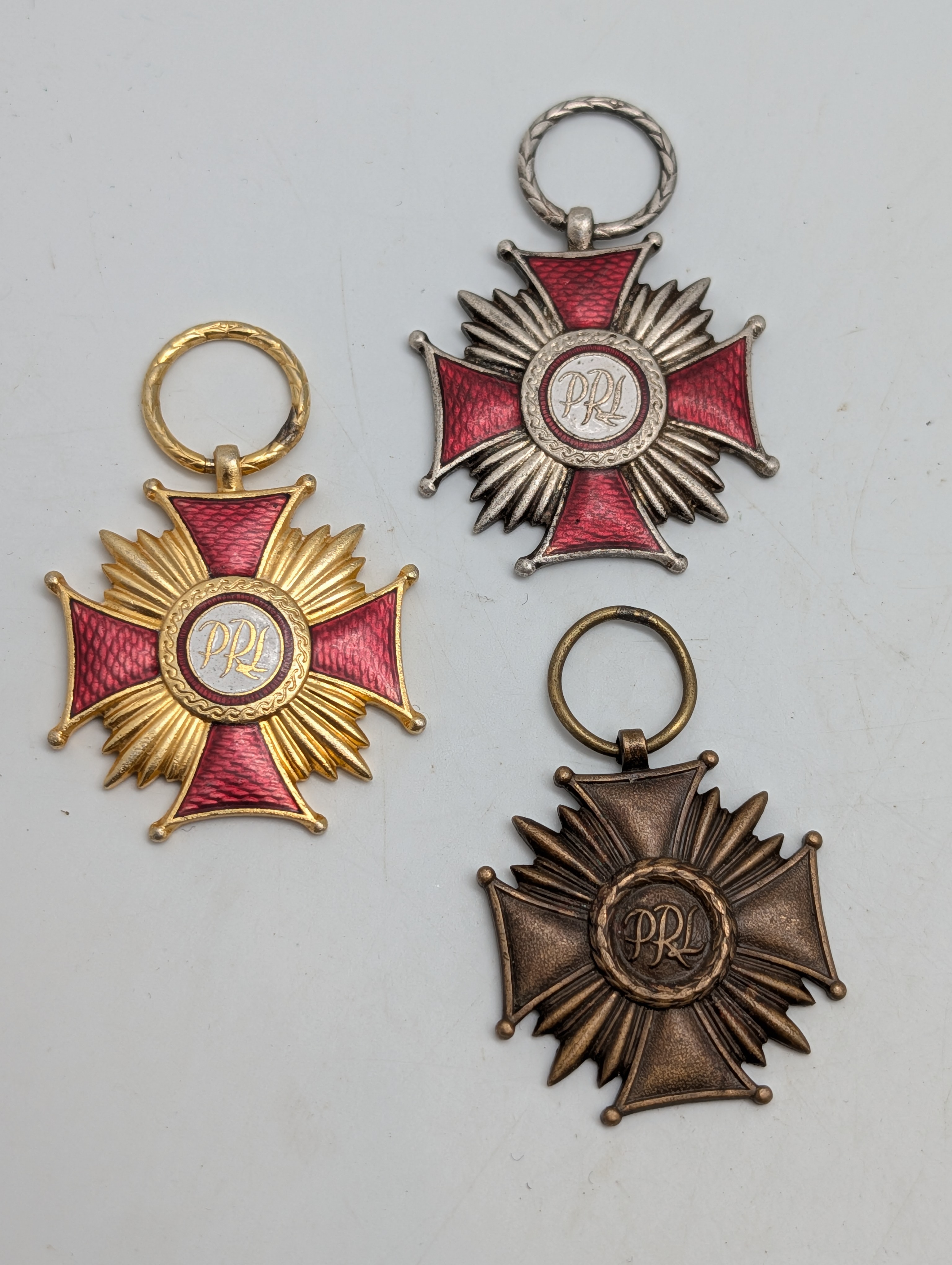 Sæt med tre polske PRL Fortjenstkors (Guld, Sølv og Bronze)