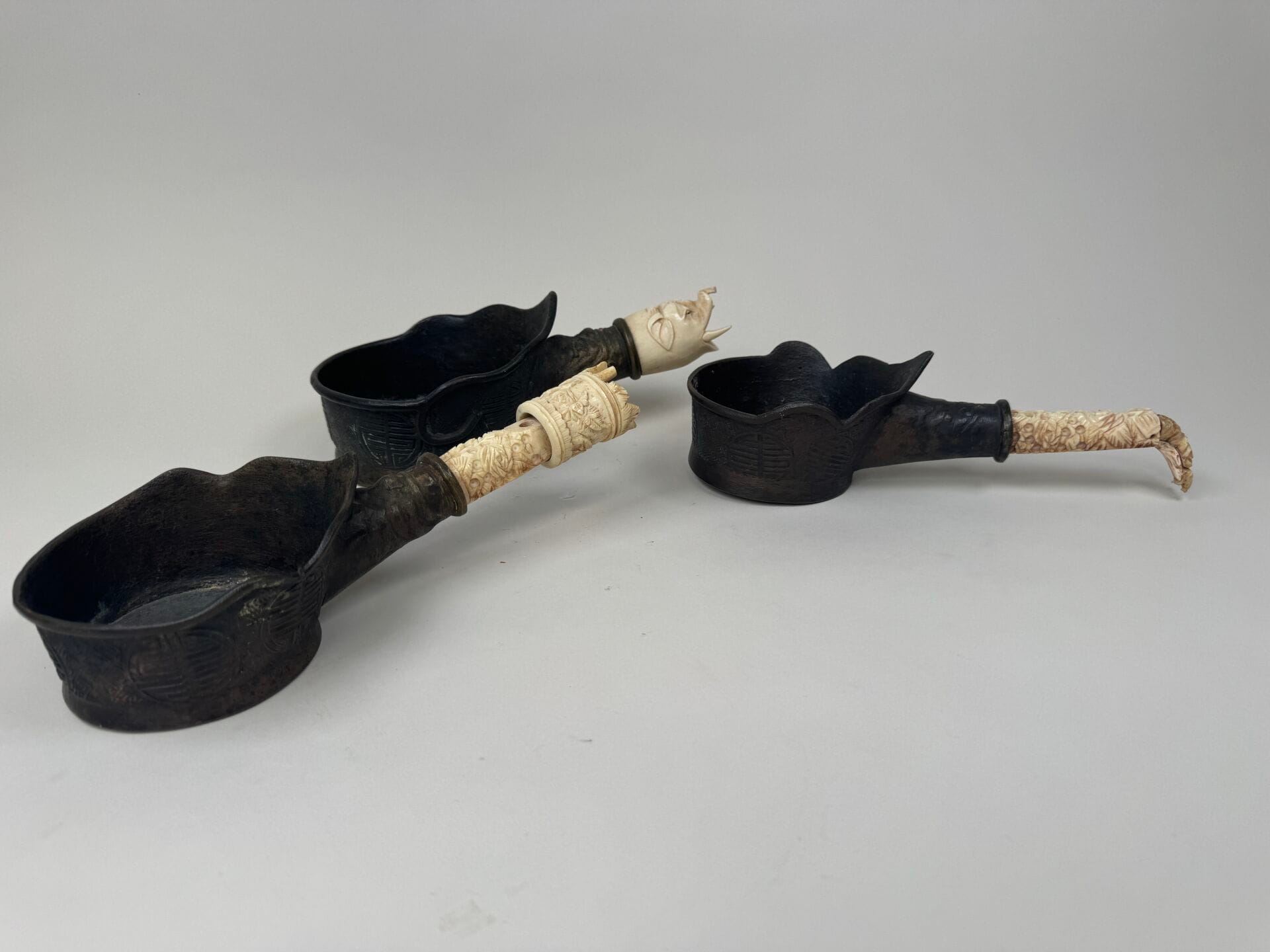 Three Chinese Bronze Irons