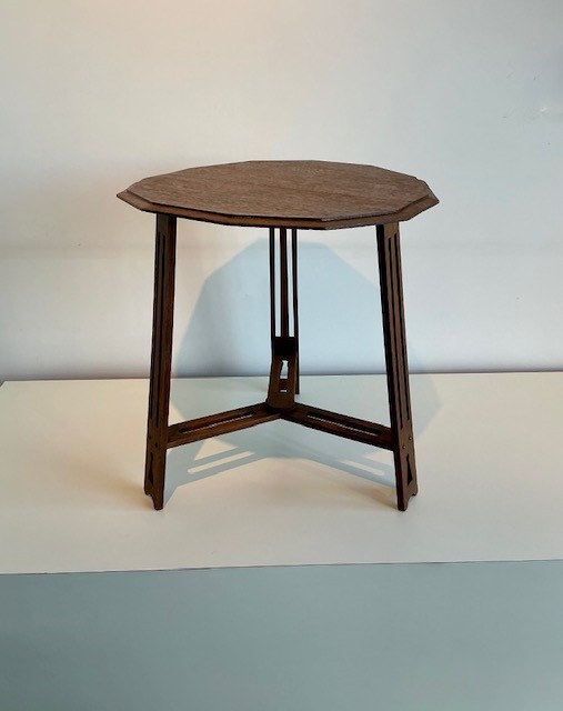Oak side table with 3 legs and 12-sided top